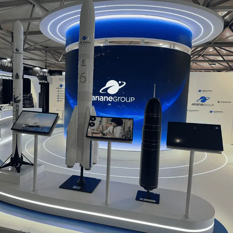 ArianeGroup exhibition booth with rocket models