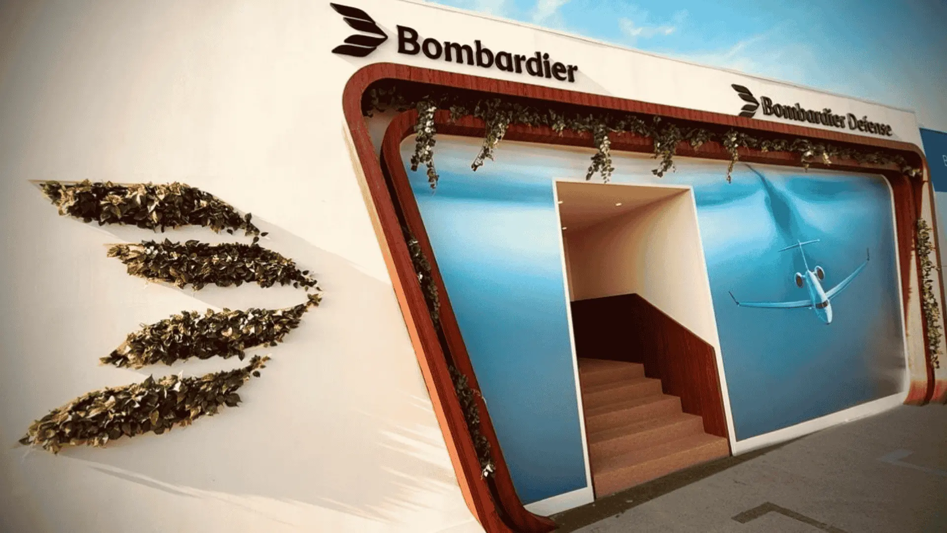 Bombardier Defense exhibition booth with aircraft display