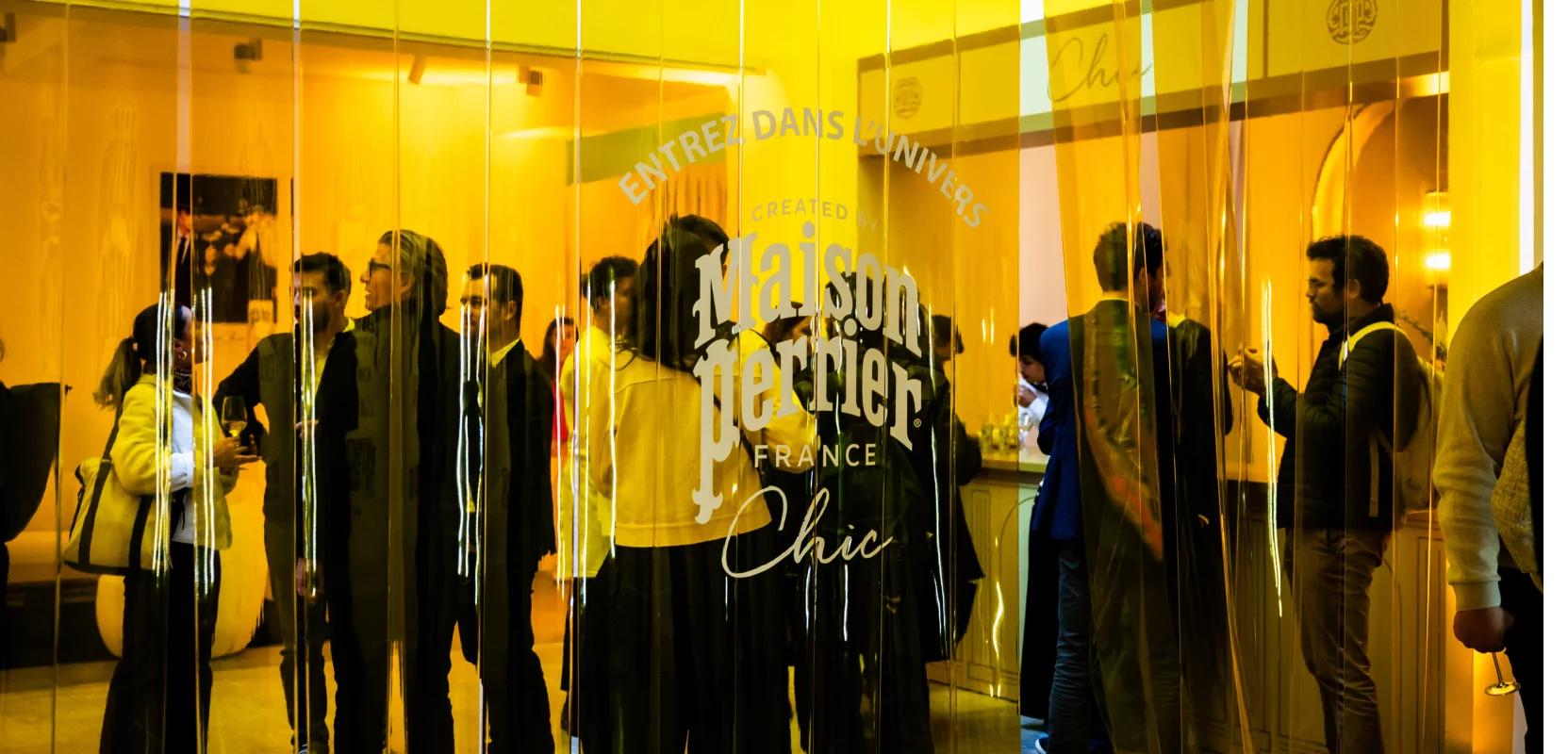 People mingling inside Maison Perrier boutique event