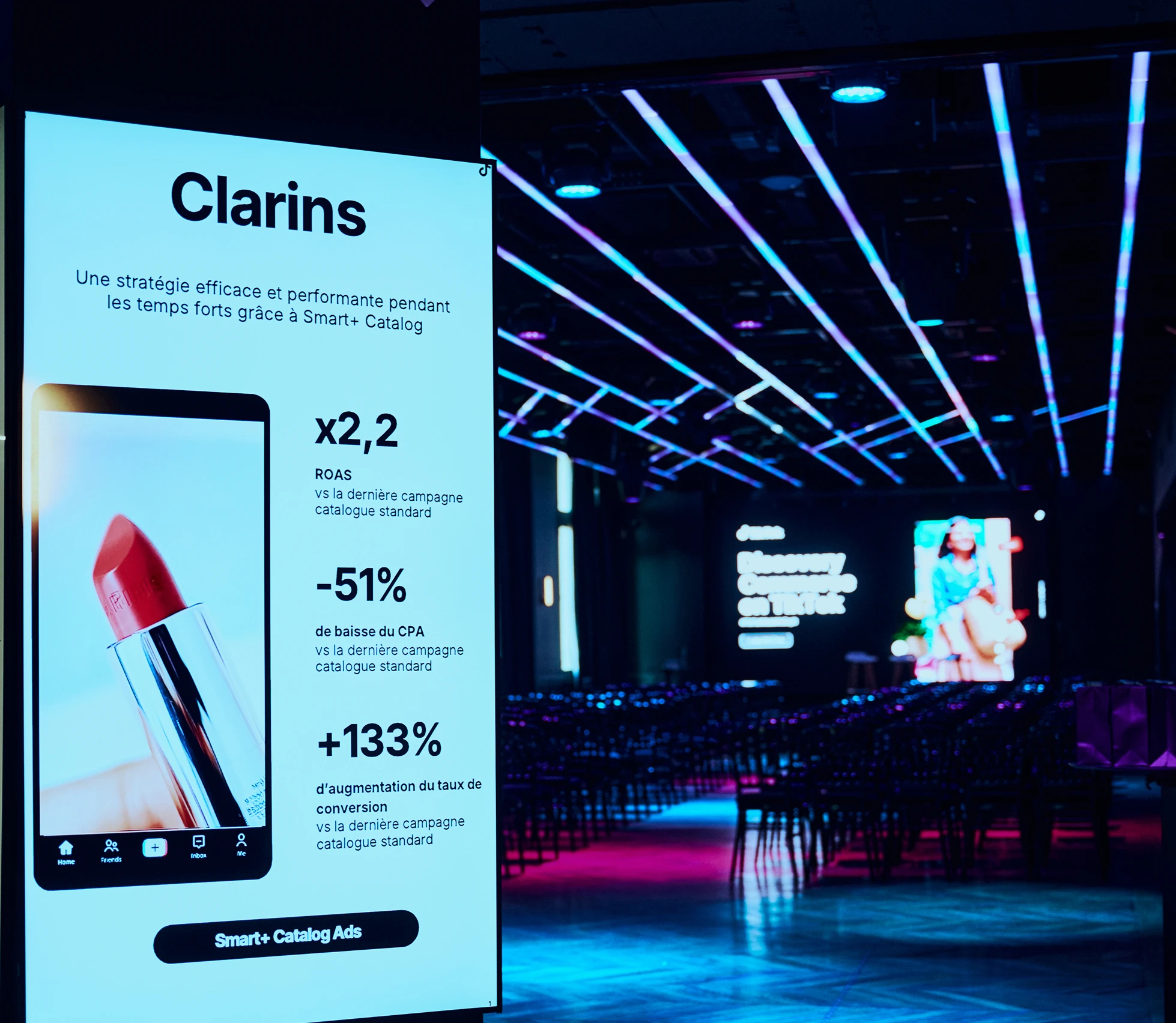 Clarins promotional display at modern conference venue